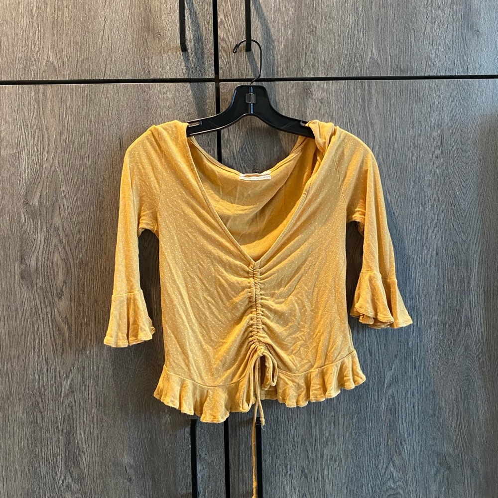 Yellow polka dot tie top with bell sleeves